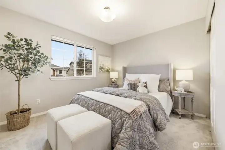 One of the two bedrooms upstairs