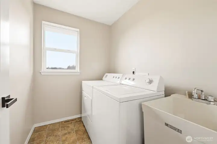 Laundry room just off the primary
