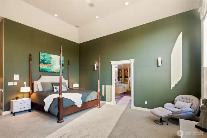 Primary suite highlighted by soaring vaulted ceilings ~