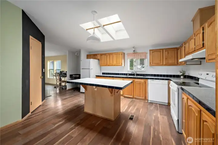 Spacious kitchen with center island and pantry