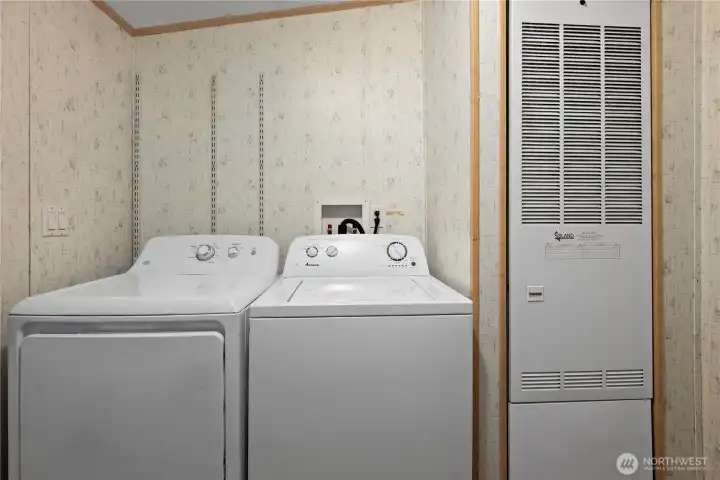Laundry room with cabinets & shelving