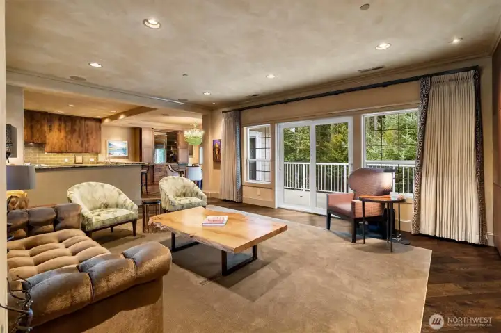 An open, thoughtfully designed layout creates a seamless connection between the living, kitchen, and dining spaces, each distinct yet effortlessly connected.