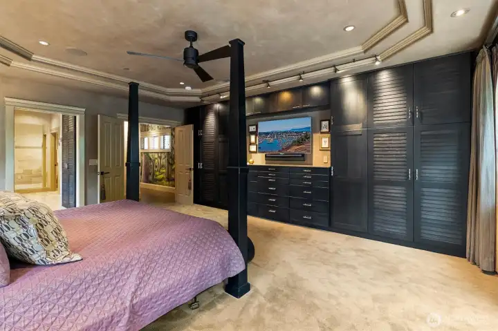 DeWils custom cabinetry with marble countertops brings both elegance and functionality to the space.