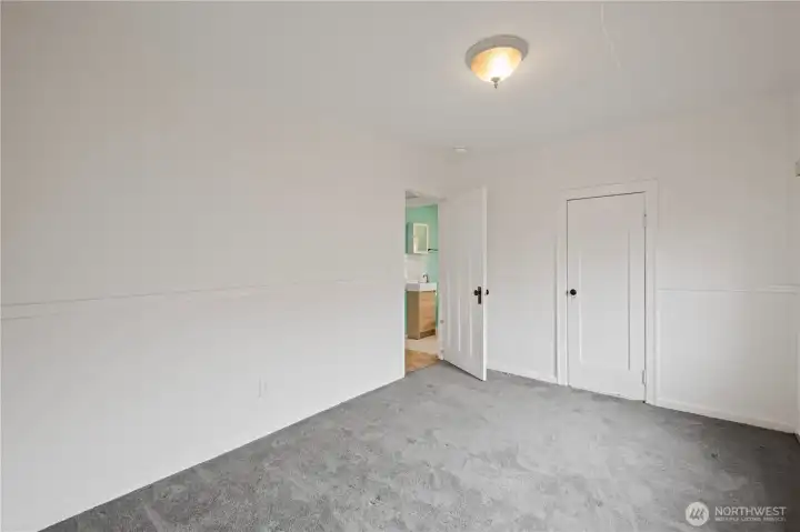 Primary Bedroom with new carpet.