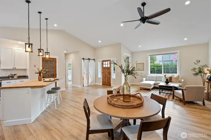 Wide view of main living space and front door