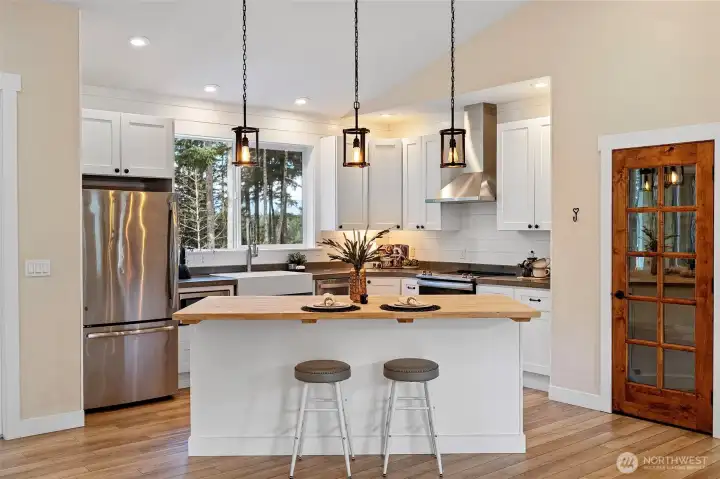 Custom kitchen with butcher block island