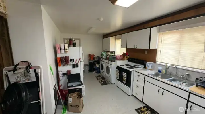 Here is another view of the kitchen and utility area for unit 523 (currently occupied).