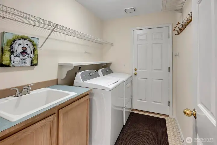 Laundry leads to garage.