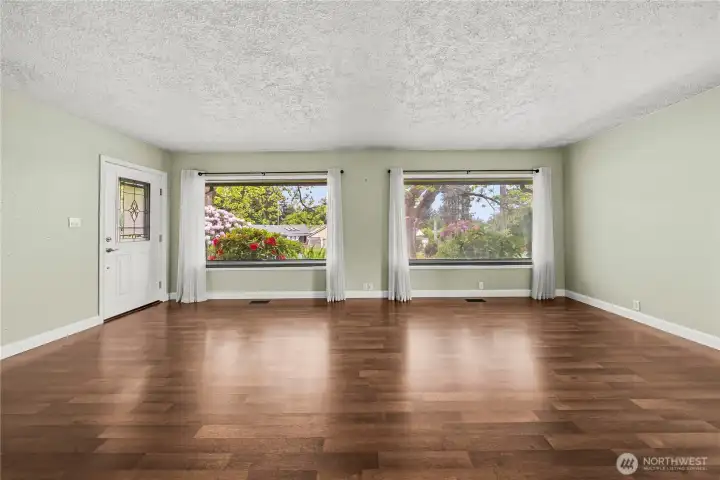 Bright living room w/window shades for privacy Bright living room w/window shades for privacy