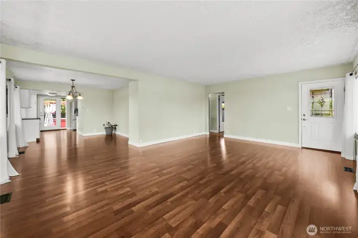 open space from living room into dining room open space from living room into dining room