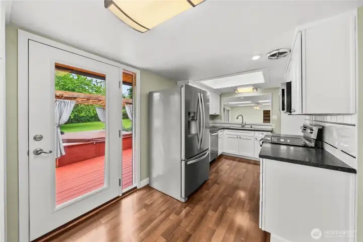 Updated Kitchen. New skylights lets lots of natural light through Updated Kitchen. New skylights lets lots of natural light through