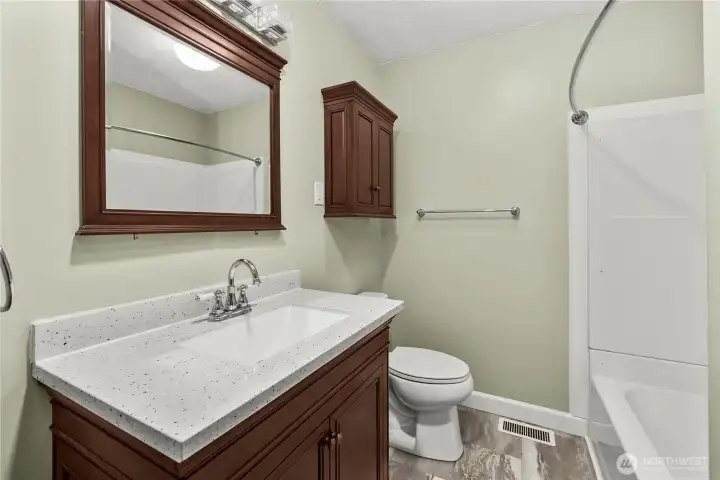 Updated bathroom between bedrooms & kitchen area Updated bathroom between bedrooms & kitchen area