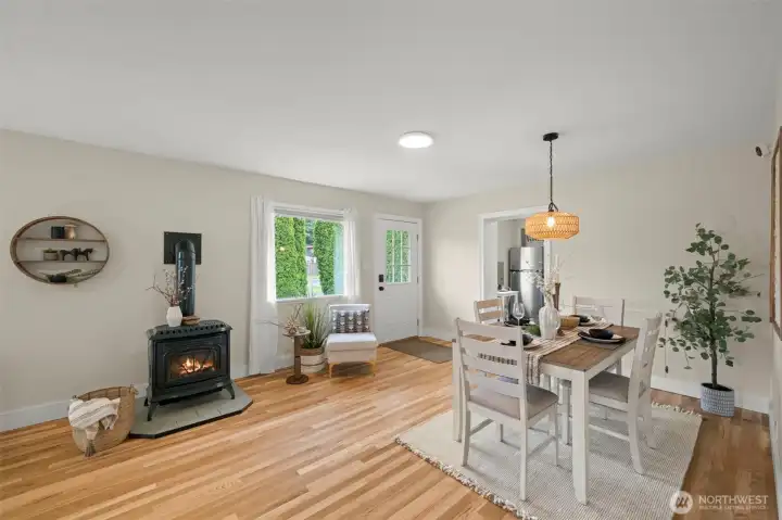 Cozy Sitting Area Next to Gas Free Standing Fireplace Cozy Sitting Area Next to Gas Free Standing Fireplace