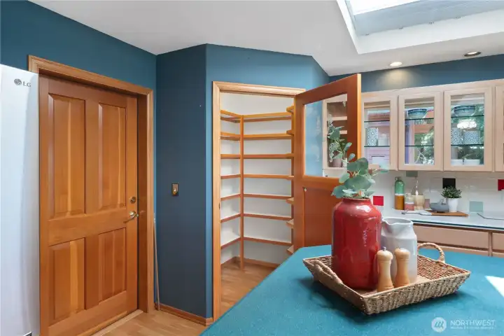 Walk in pantry while the door to the right goes to the 2 car-attached garage.