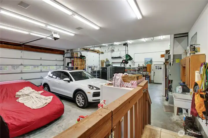 Oversized, finished 3 car garage with 14 ft. door in 3rd bay. . . Oversized, finished 3 car garage with 14 ft. door in 3rd bay. . .