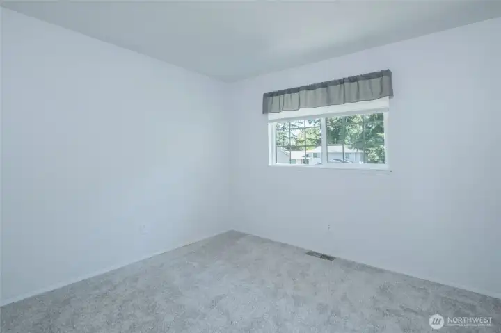 Top floor bedroom filled with natural light. Top floor bedroom filled with natural light.