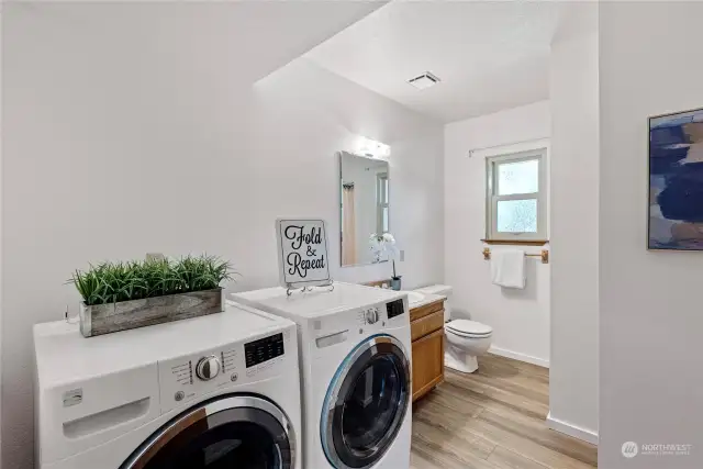 Laundry room with 3/4 bathroom