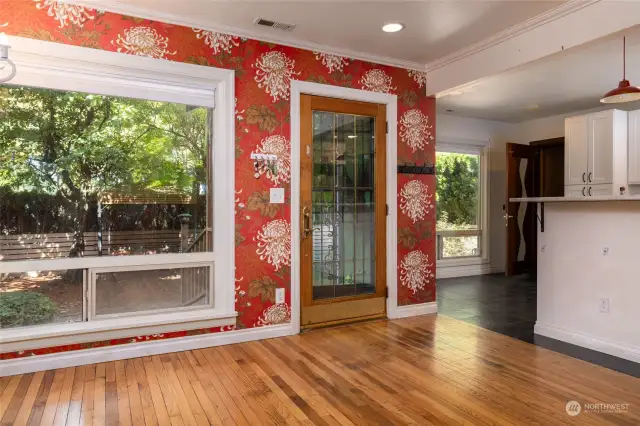 Entry door and living room.  Water feature is just outside the front door.