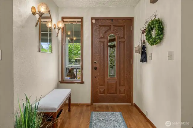 Inviting entryway that has plenty of space for guests to linger
