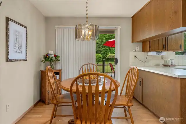 Kitchen eating space with sliding door to back porch. From cozy breakfast to intimate dinners