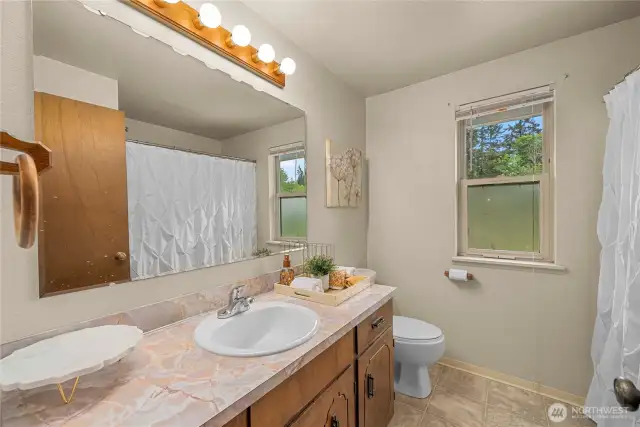 Full bath with shower/tub combo