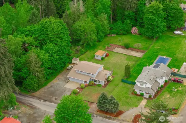Arial view of home! Look at all that open space! Plus designated play area, garden space and two sheds!
