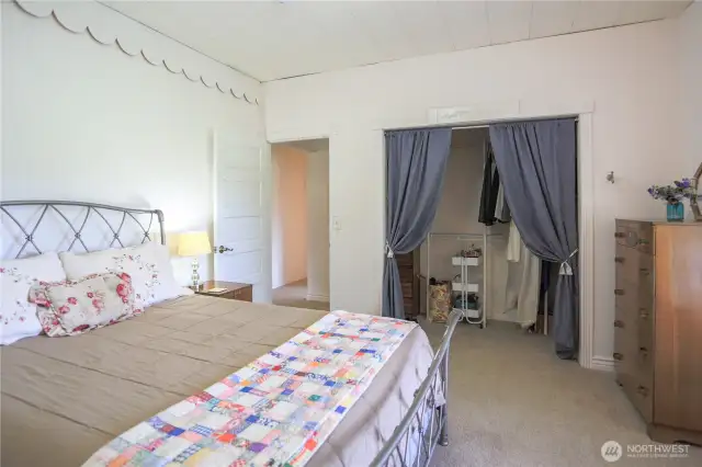 The third bedroom boasts a farmhouse charm that gives it a cozy, rustic vibe. It's the perfect spot for a guest room, kid's room, or simply to create a welcoming, comfortable space within the home.