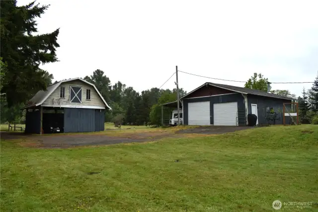 Barn features a hayloft and stalls for your animals.  The shop is 28 x 32.  Just the place for your tools and toys.