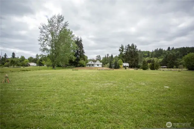This home is on a corner lot.  This is looking up at the house from the lower field.