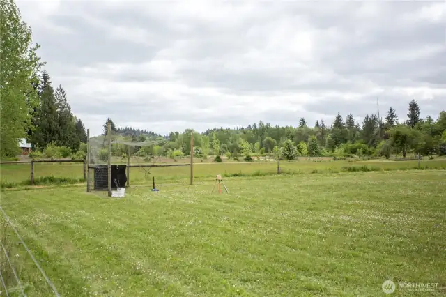 The home owners lovingly built a little league sized baseball field in the lower acreage so the neighorhood kids can practice. They have enjoyed sharing with their little community,