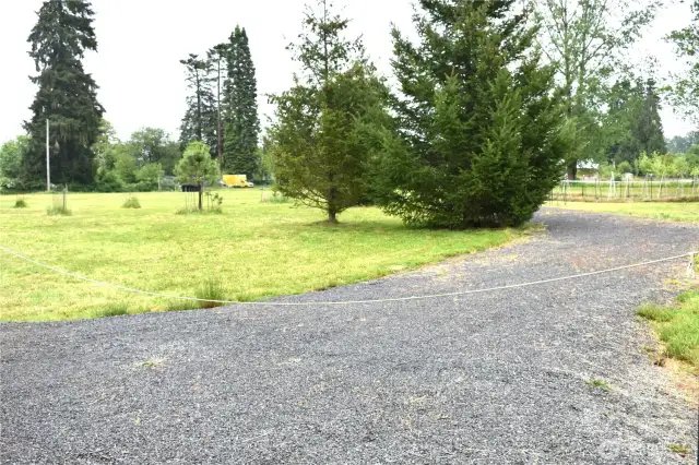 Additional driveway and RV parking pad.