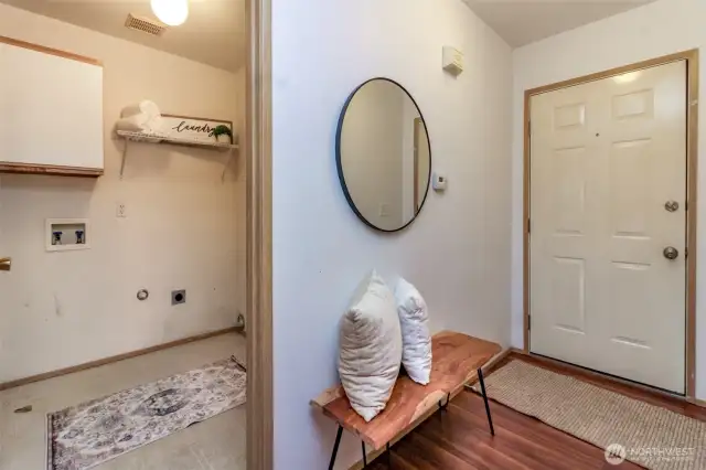 Backside of the entry facing the utility room and door that leads to the garage.