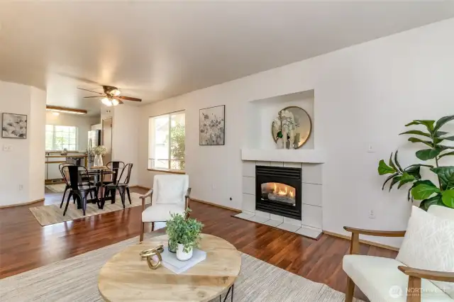 Natural gas fireplace, ceiling fans and this home has central air.
