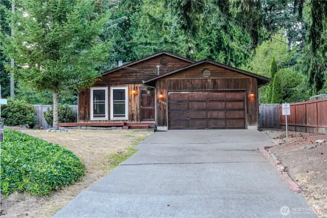 Welcoming exterior of your charming lake home
