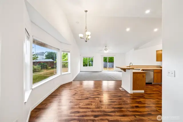 This open, Great Room concept provides additional living space that lives large with the vaulted ceiling.