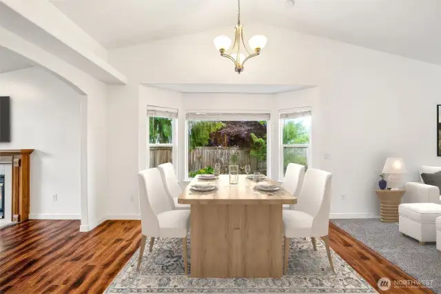 This spacious Eating Area allows for easily gathering with you favorite guests, whilE still being a part of the conversation in the Family Room and/or the Livings Room. Virtually srtaged.