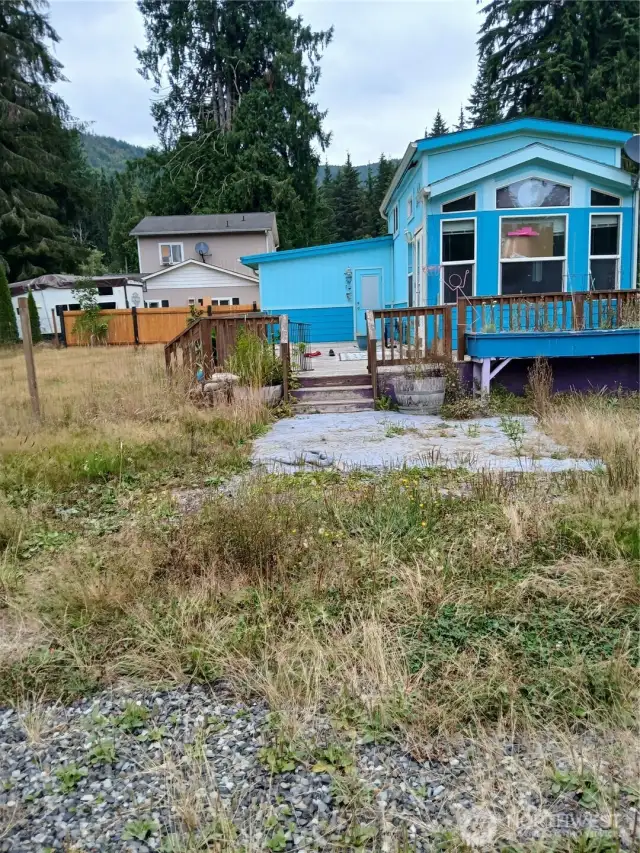 tiny home, room on the left and deck are additions