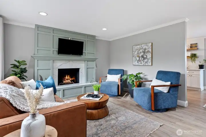 Updated living room with gorgeous fireplace