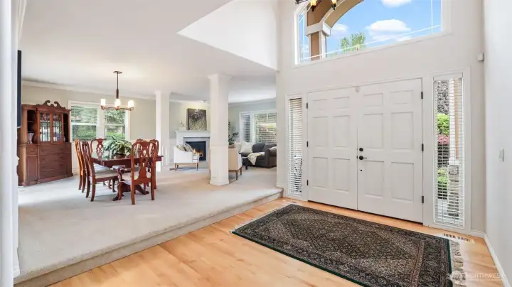Step into a grand entry filled with beautiful, inviting natural light
