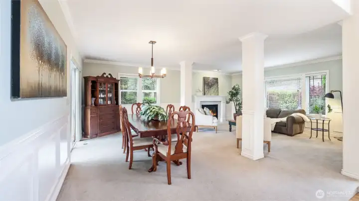 A gracious formal sitting and dining area designed for hosting everything from intimate dinners to grand celebrations.