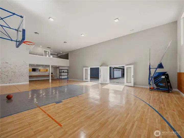 Half court basketball court with loft area that overlooks the court.  2 office spaces complete this incredible space.