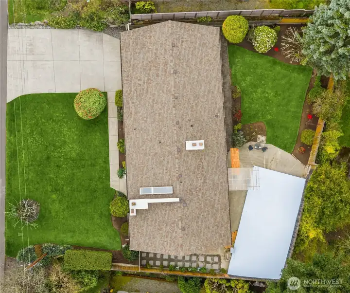 Lovely front and back landscaping with a brand new paver patio.