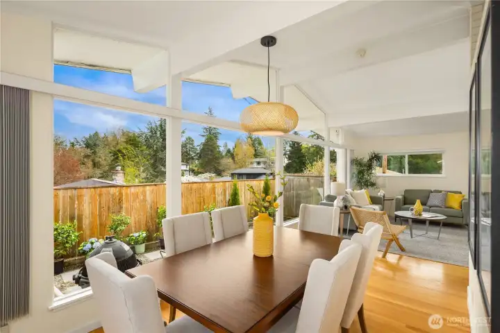 Open flow between the living and dining rooms is ideal for gatherings.