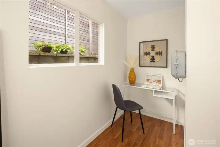 Don't miss this hidden office/workout area just off the garage!