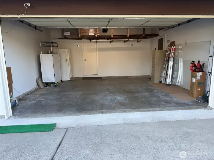 Two-car garage with overhead storage.
