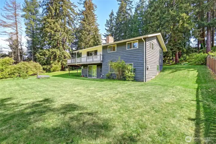 Built in 1960 modern classic includes 3 parcels. Seller has tagged trees/bushes that will so with seller.