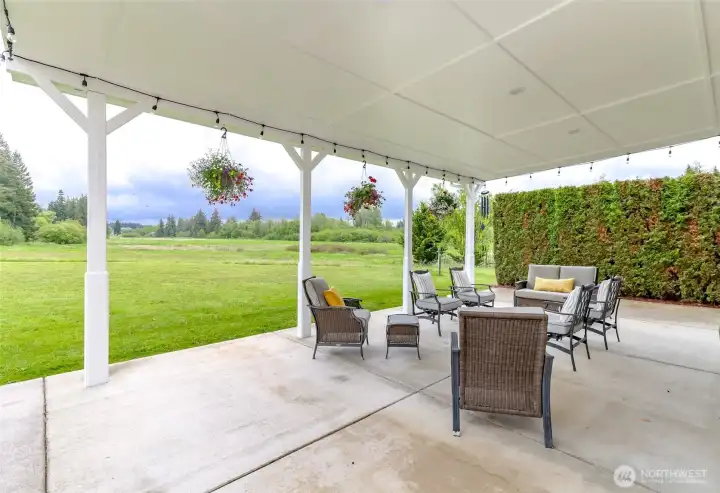 Immense Covered Back Patio with Recessed Lighting