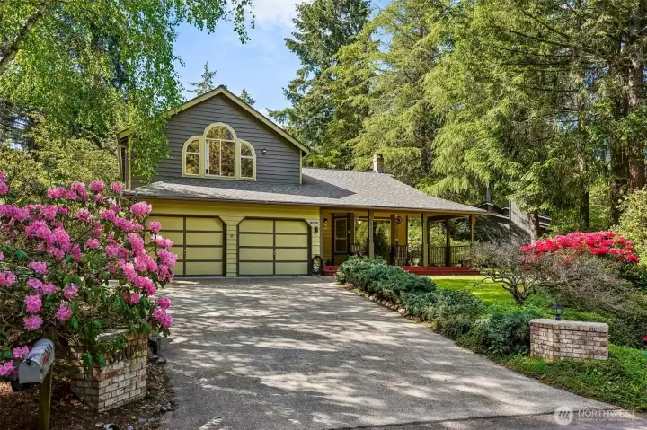 A wraparound porch, towering evergreens, and serious PNW storybook vibes… the kind of home that instantly gives you that “welcome home” feeling the second you pull into the driveway.