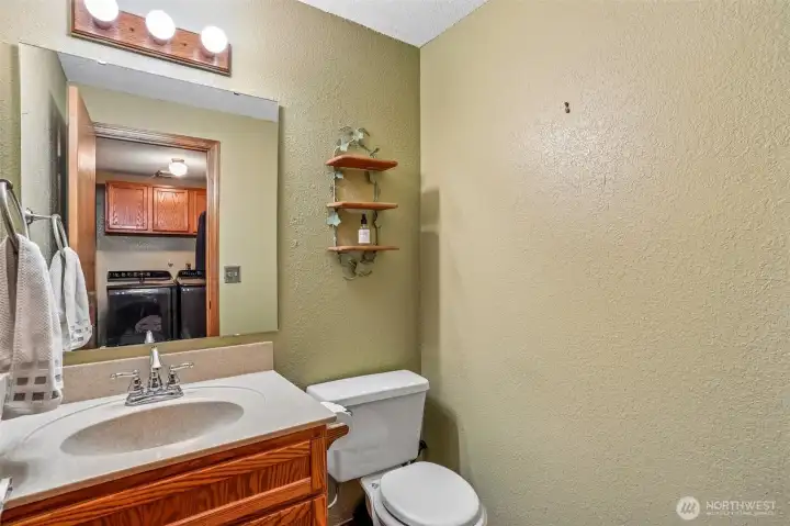 We love that the main level half bathroom is tucked away from the main living spaces… private, practical, and perfect when you have guests over.