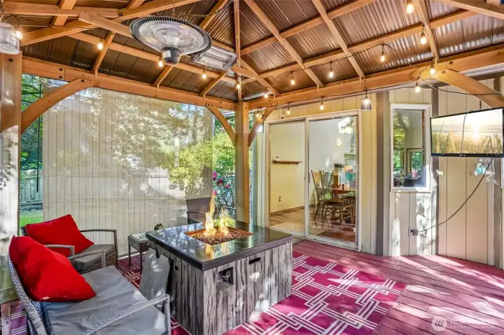 Seamless indoor-outdoor flow from the dining room to the covered deck